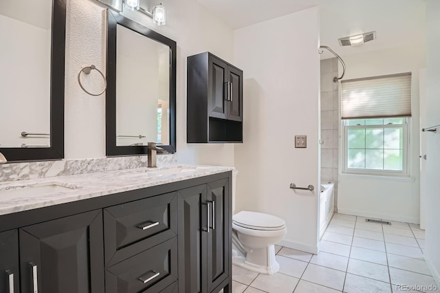 4664 S Zang St, Morrison, CO 80465 - bathroom featuring double vanity, shower / tub combination, and tile patterned floors
