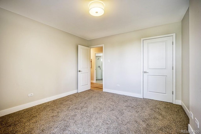 unfurnished bedroom with carpet floors