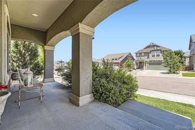 view of patio / terrace with a garage