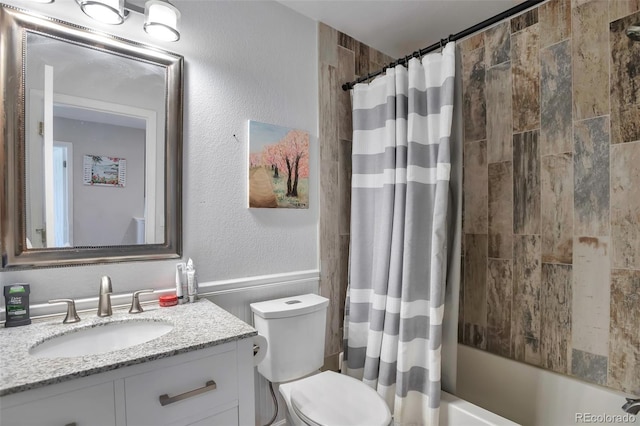 9889 Aftonwood St, Highlands Ranch, CO 80126 - full bath with vanity, toilet, shower / bath combo with shower curtain, and a textured wall