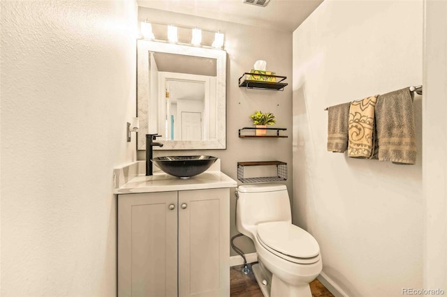 12234 W Saratoga Ave, Morrison, CO 80465 - bathroom with vanity and wood finished floors