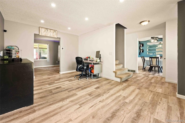 12234 W Saratoga Ave, Morrison, CO 80465 - home office with wood finished floors, a textured ceiling, recessed lighting, and a ceiling fan