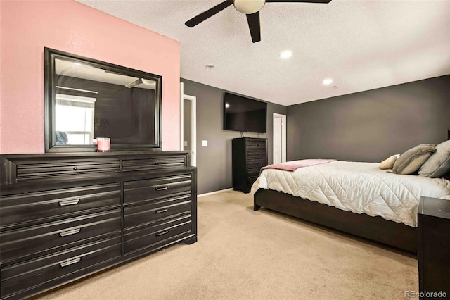 12234 W Saratoga Ave, Morrison, CO 80465 - bedroom with light carpet, a textured ceiling, ceiling fan, and recessed lighting