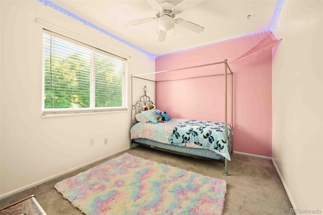 12234 W Saratoga Ave, Morrison, CO 80465 - carpeted bedroom with baseboards and ceiling fan