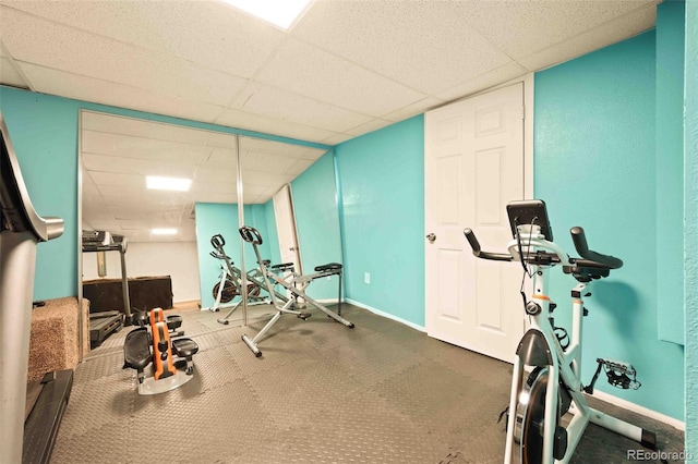 12234 W Saratoga Ave, Morrison, CO 80465 - exercise area featuring a drop ceiling and baseboards