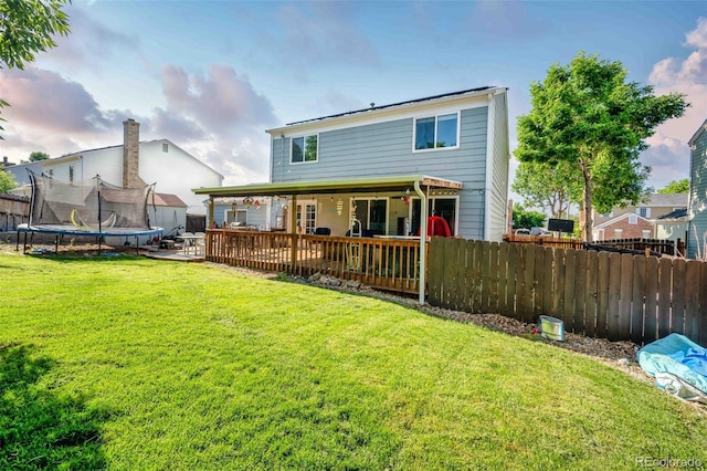 12234 W Saratoga Ave, Morrison, CO 80465 - back of house with a trampoline