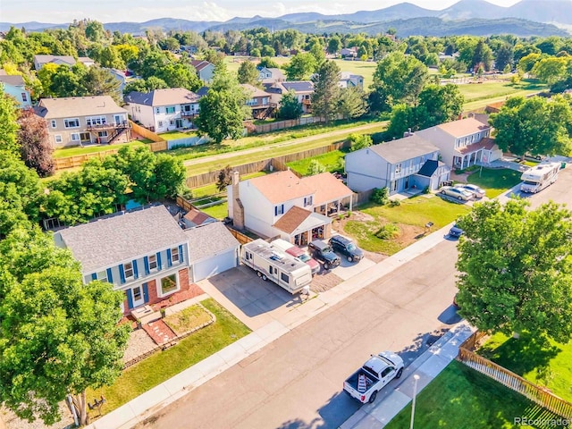 12234 W Saratoga Ave, Morrison, CO 80465 - aerial perspective of suburban area featuring a mountain backdrop