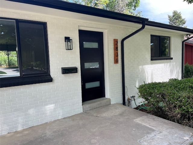 2836 S Fenton St, Denver, CO 80227 - entrance to property featuring brick siding