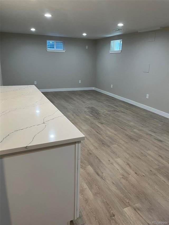 2836 S Fenton St, Denver, CO 80227 - below grade area featuring light wood-type flooring and recessed lighting