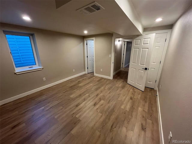 2836 S Fenton St, Denver, CO 80227 - unfurnished bedroom with wood finished floors and recessed lighting