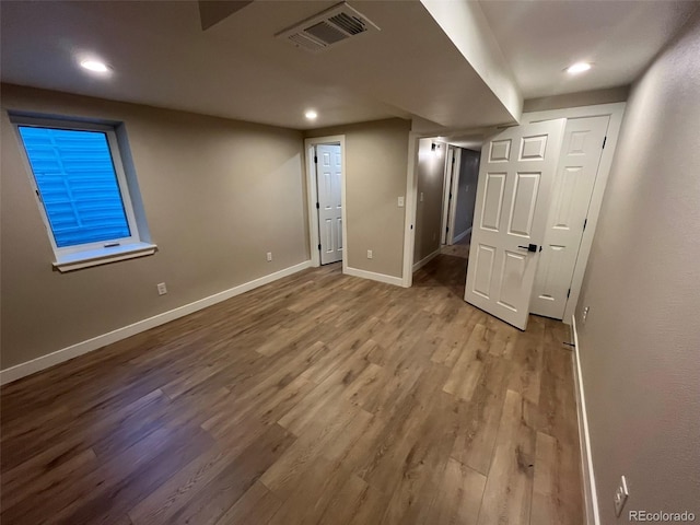 2836 S Fenton St, Denver, CO 80227 - unfurnished bedroom with wood finished floors and recessed lighting