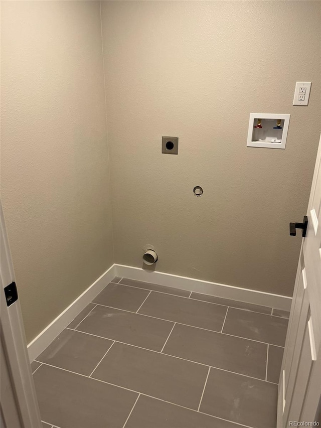 2836 S Fenton St, Denver, CO 80227 - washroom featuring electric dryer hookup, washer hookup, and dark tile patterned flooring