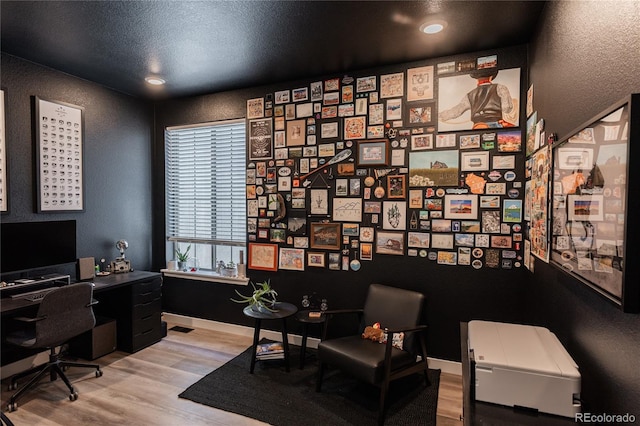 home office featuring light hardwood / wood-style floors