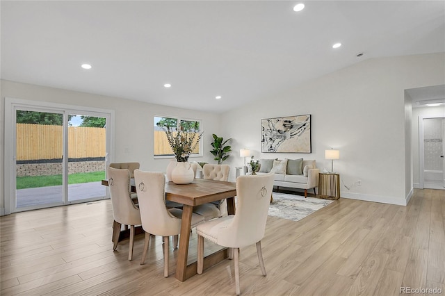 8357 Dudley Ct, Arvada, CO 80005 - dining room featuring vaulted ceiling, light wood-type flooring, and recessed lighting