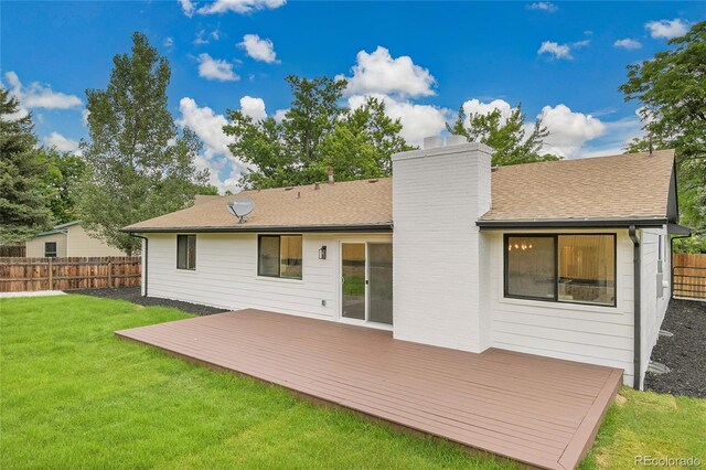 8357 Dudley Ct, Arvada, CO 80005 - rear view of property with a chimney, a deck, and a shingled roof