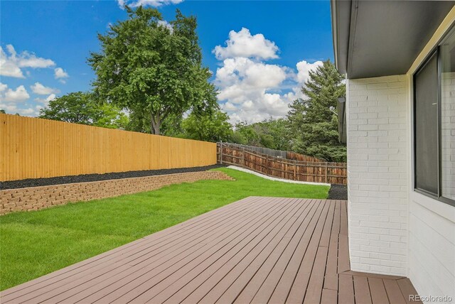8357 Dudley Ct, Arvada, CO 80005 - wooden terrace featuring a fenced backyard