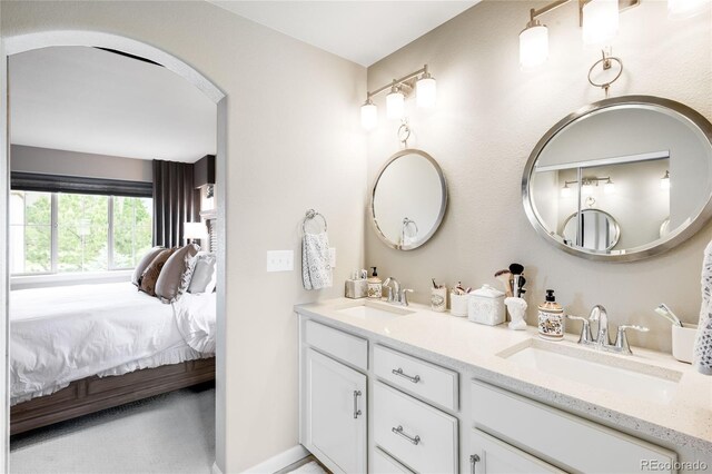 15205 W Baker Ave, Lakewood, CO 80228 - bathroom featuring ensuite bath and double vanity