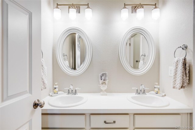 15205 W Baker Ave, Lakewood, CO 80228 - bathroom featuring double vanity