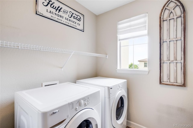 15205 W Baker Ave, Lakewood, CO 80228 - laundry area featuring washer and clothes dryer and baseboards