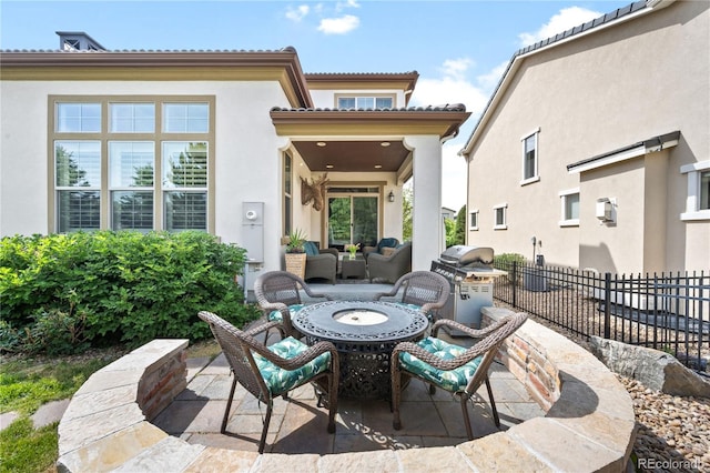 15205 W Baker Ave, Lakewood, CO 80228 - view of patio / terrace featuring a grill and an outdoor living space