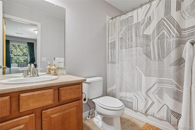 8677 S Buchanan Way, Aurora, CO 80016 - bathroom with vanity and tile patterned flooring