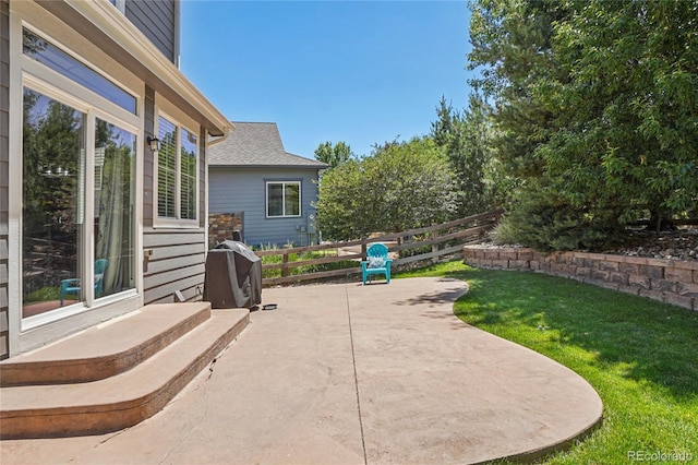 8677 S Buchanan Way, Aurora, CO 80016 - view of patio / terrace featuring a grill