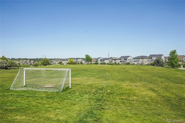 8677 S Buchanan Way, Aurora, CO 80016 - view of yard featuring an area for sports and a residential view