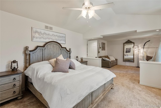 carpeted bedroom with lofted ceiling and ceiling fan