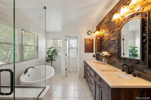 bathroom with vanity, tile patterned floors, and a bathing tub