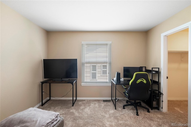 office area featuring light colored carpet