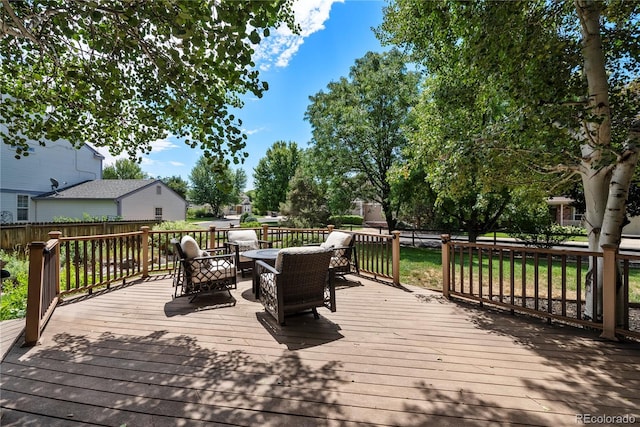 deck featuring outdoor lounge area