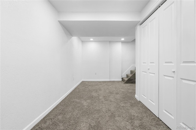 basement with carpet flooring