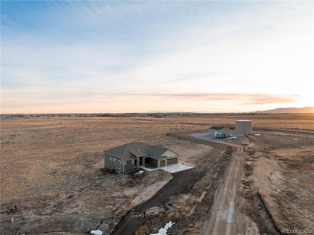 aerial view at dusk with a rural view