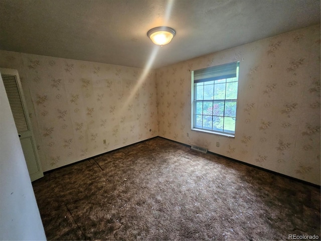 912 E 6th Ave, Broomfield, CO 80020 - bonus room with carpet floors and wallpapered walls