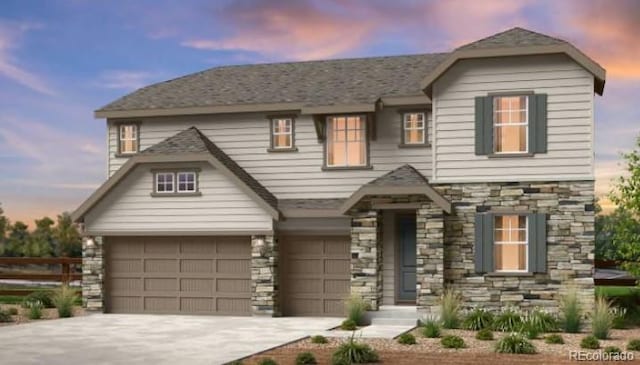 view of front of property with a garage, concrete driveway, and stone siding