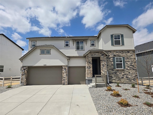 5629 Farrier Pt, Castle Rock, CO 80104 - view of front of home with stone siding, concrete driveway, and a garage