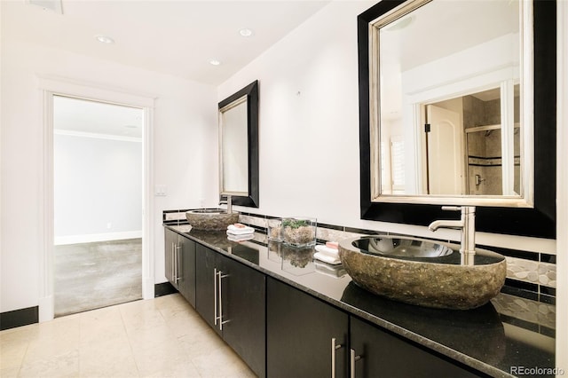 bathroom featuring vanity and tile patterned flooring