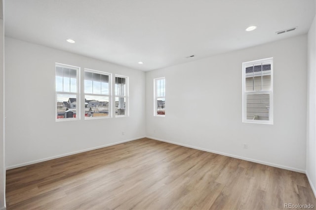 empty room featuring light hardwood / wood-style floors