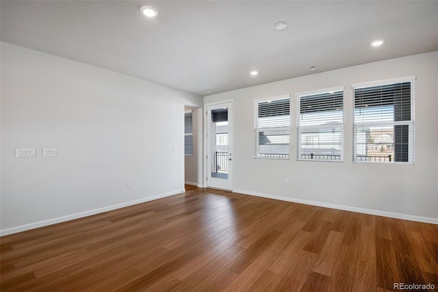 unfurnished room featuring wood-type flooring