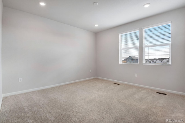 view of carpeted spare room