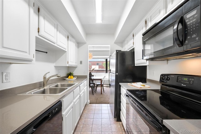 534 E 7th Ave Unit 203, Denver, CO 80203 - kitchen featuring black appliances, white cabinetry, light tile patterned floors, and light countertops
