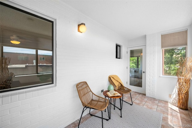 534 E 7th Ave Unit 203, Denver, CO 80203 - sitting room featuring light tile patterned floors