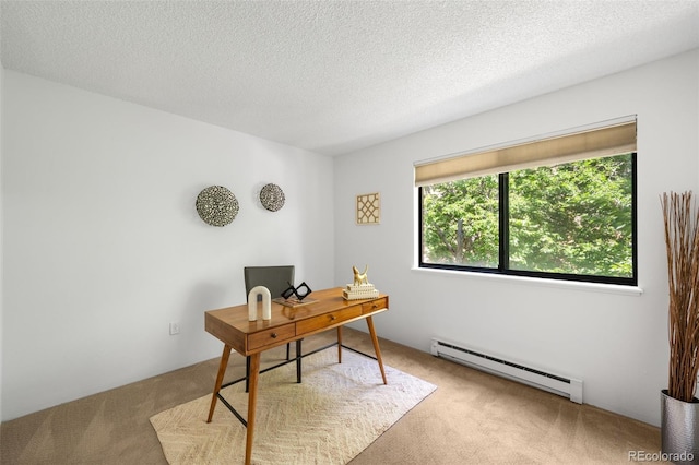 534 E 7th Ave Unit 203, Denver, CO 80203 - carpeted home office featuring a baseboard radiator and a textured ceiling