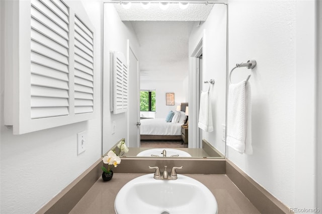 534 E 7th Ave Unit 203, Denver, CO 80203 - ensuite bathroom with a sink