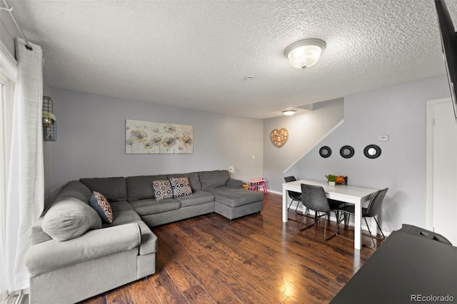 8059 Wolff St Unit C, Westminster, CO 80031 - living area with a textured ceiling and wood finished floors