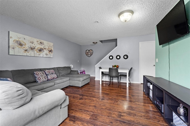 8059 Wolff St Unit C, Westminster, CO 80031 - living area featuring a textured ceiling and wood-type flooring