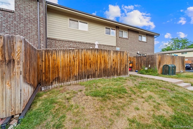 8059 Wolff St Unit C, Westminster, CO 80031 - rear view of property with brick siding