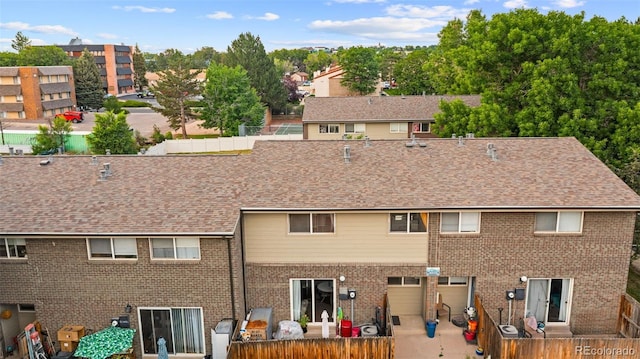 8059 Wolff St Unit C, Westminster, CO 80031 - view of property featuring a garage