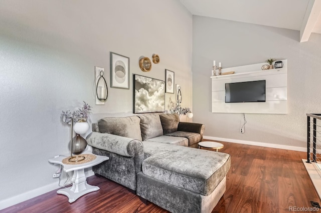 living room with dark hardwood / wood-style flooring