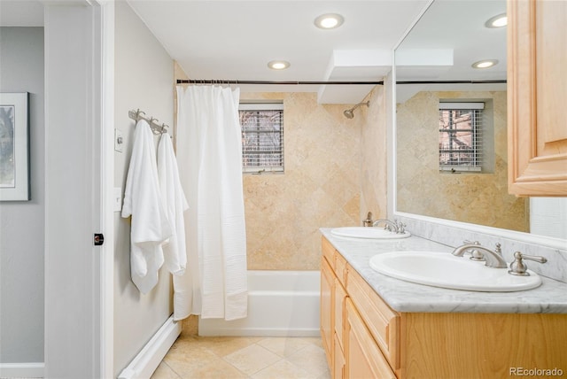 bathroom featuring tile patterned floors, vanity, and shower / bath combo with shower curtain